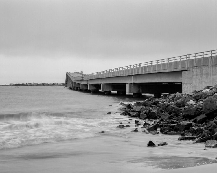 Long exposure image of a bridge and water