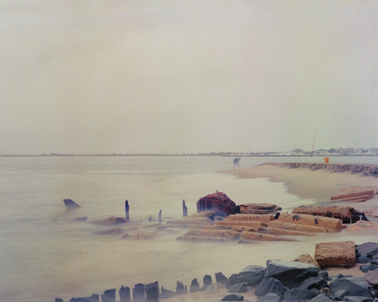 Long exposure photo of wave crashing on the beach