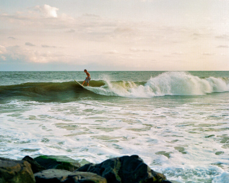 A surfer on the waves
