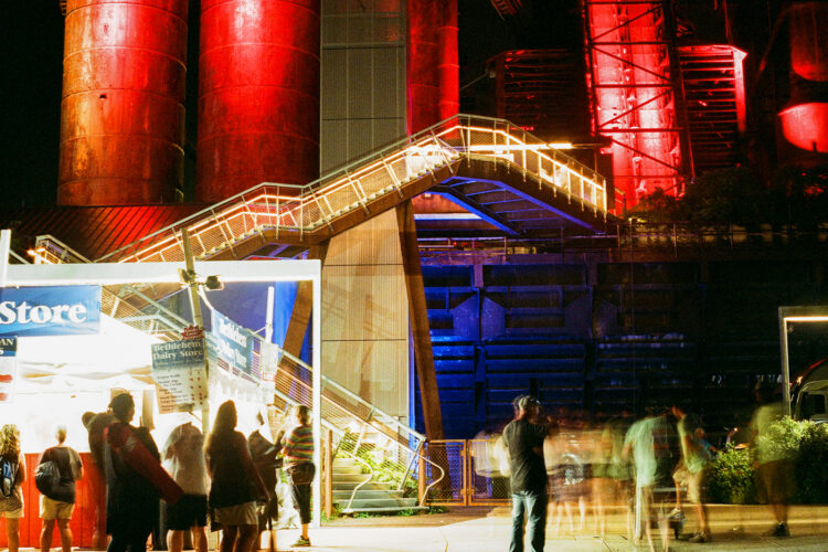 Abstraction of people moving under the Steel Stacks