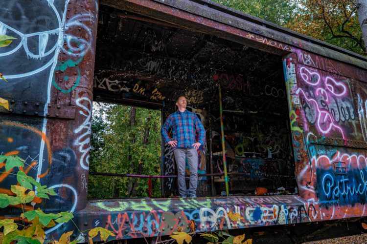 Portrait in graffiti train in Lambertville, NJ